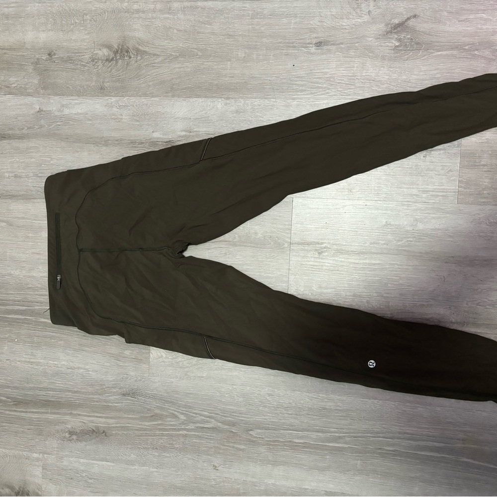 Lululemon green leggings with side pocket and holographic strip